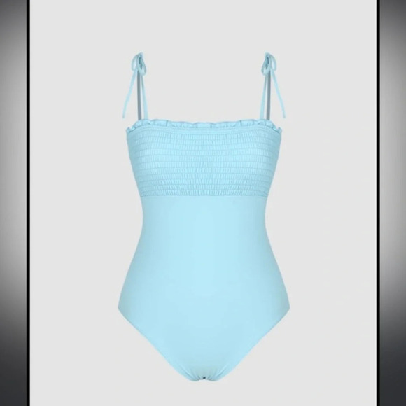 New with tags size small blue smocked one piece with sticker still attached - Picture 1 of 4